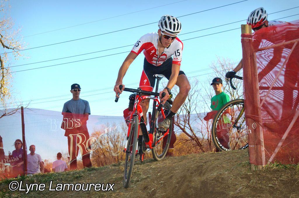 Evan McNeely leads group down off-camber turn