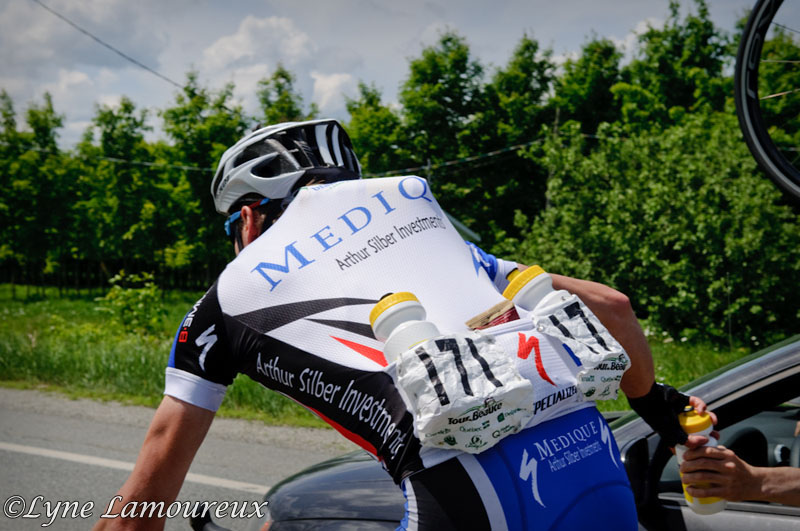 William Blackburn (Team Medique) loads up on biottles