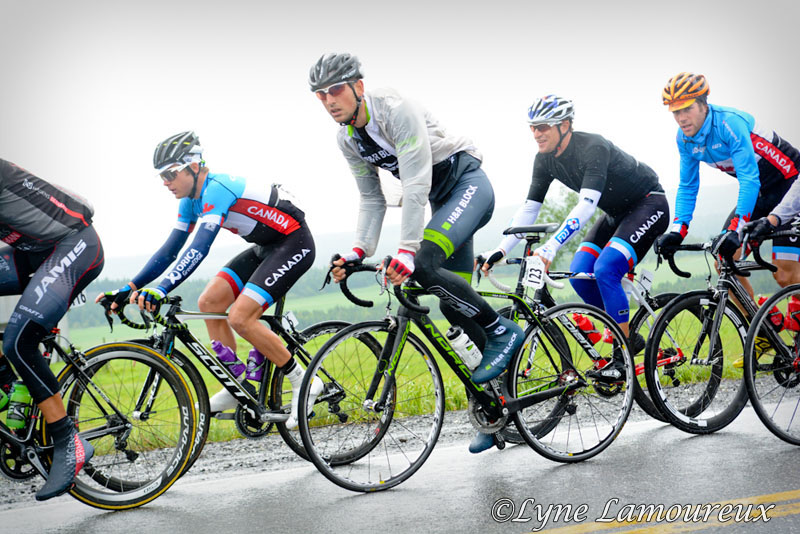 Riders in the field try to stay warm