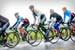 Riders in the field try to stay warm
